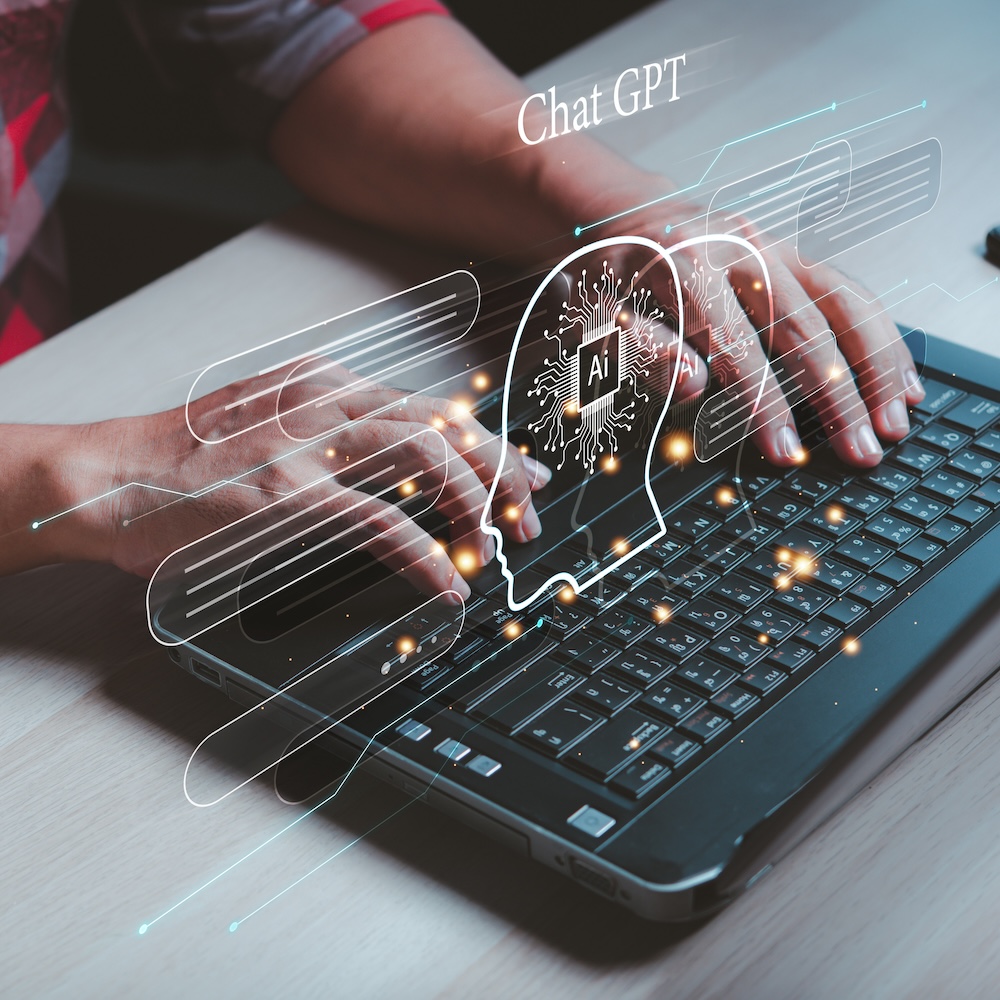 Applied AI and email systems in use on a laptop